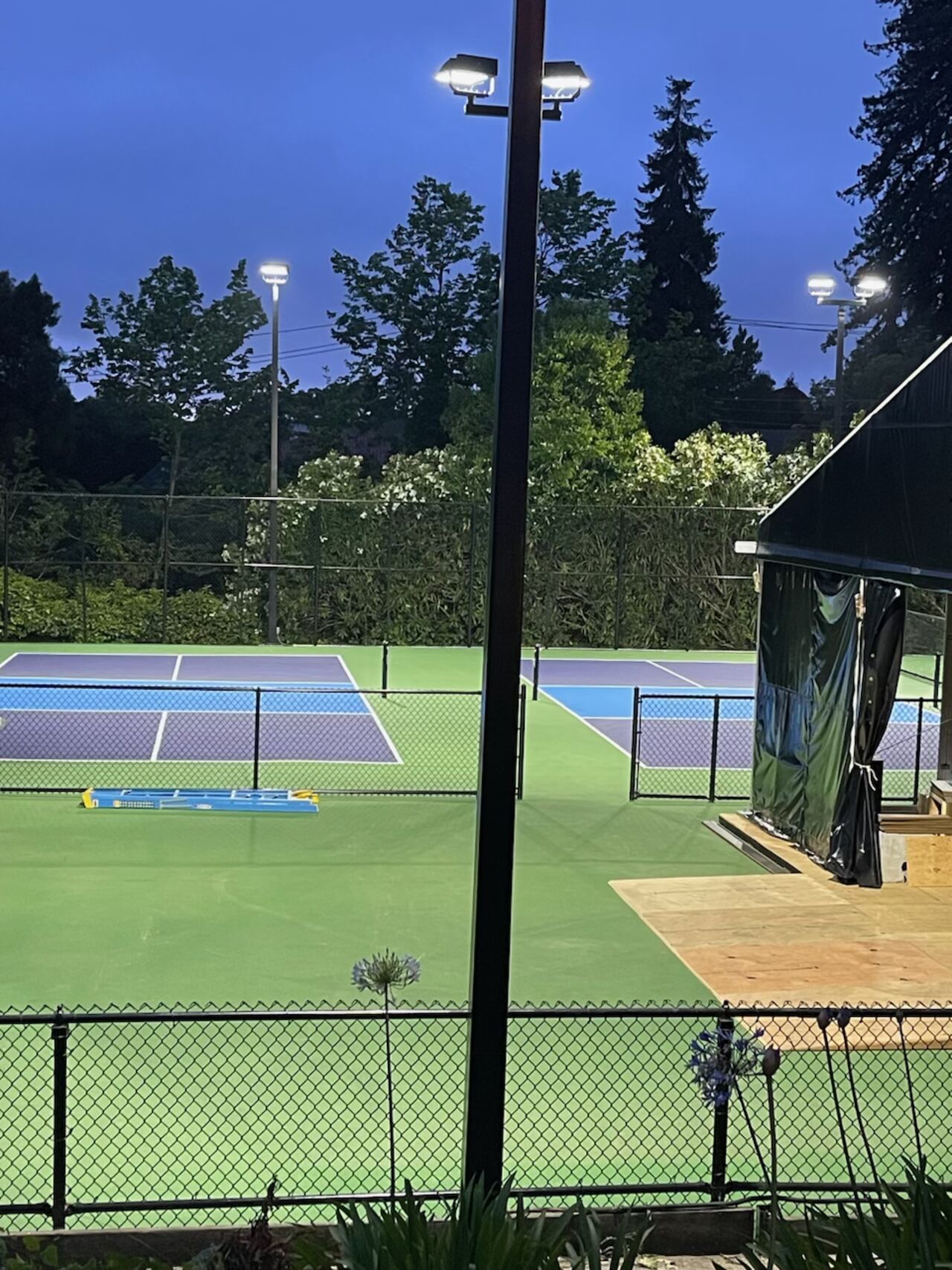 Tennis court lighting at the Claremont Club & Spa